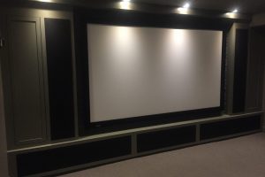 On Wall Projection Screen with Custom Cabinetry for Speakers