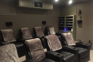 8 Seat Home Theater with Riser and Custom Audio Unit & Projector Casing