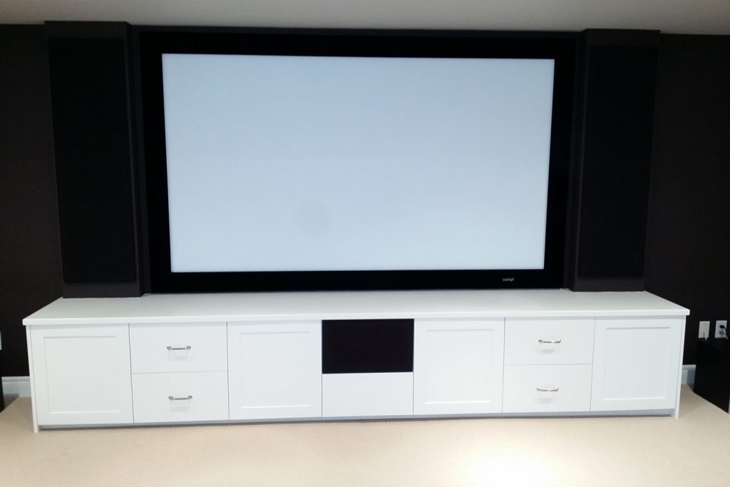 Custom Audio Furniture below 106 inch projection screen with custom cabinet and hidden speakers