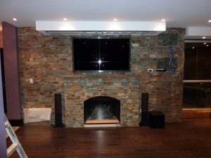 TV Over Fireplace with Drop Down Screen Above