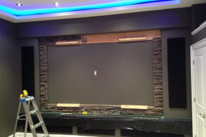 Custom Home Theater Design After Stone Work & Speaker Covers