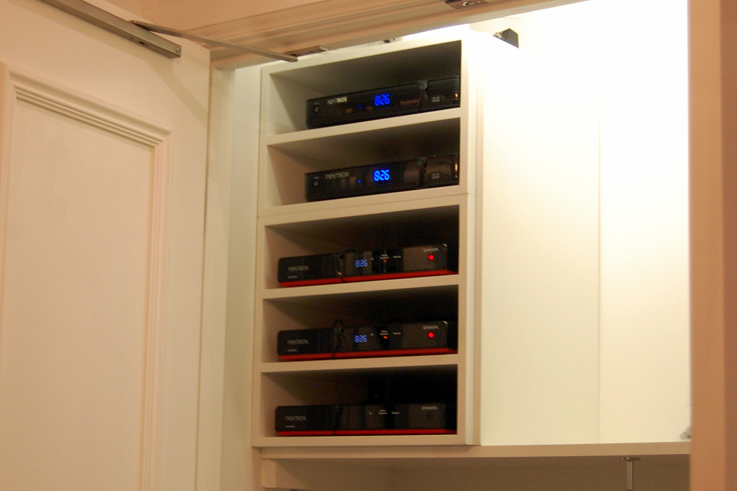 5 Tier Custom Home Audio Shelving in Condominium closet