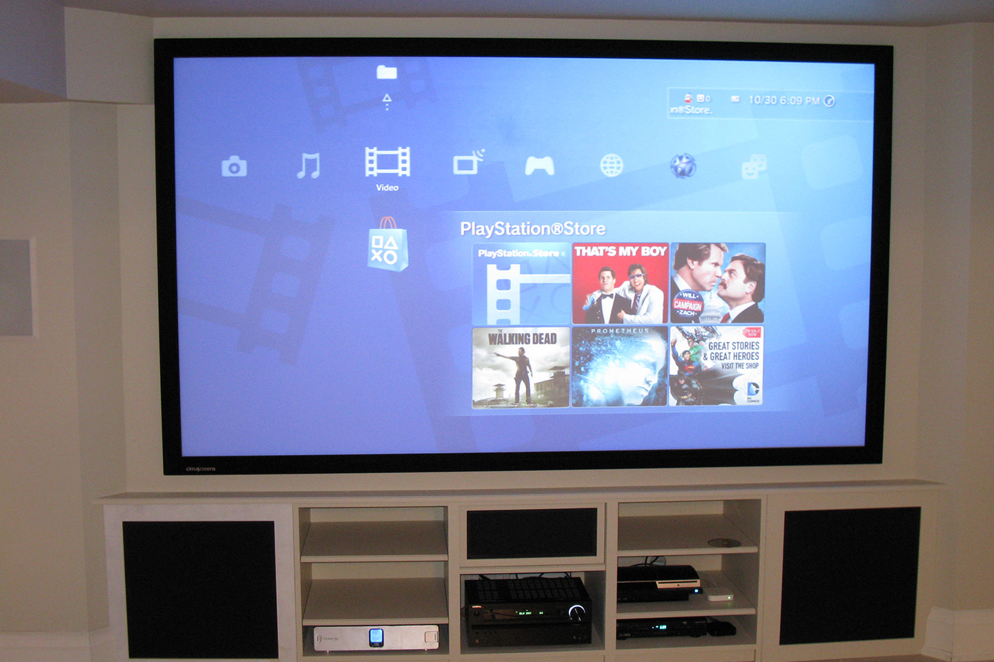 On Wall Projection Screen with Custom Cabinetry for Speakers